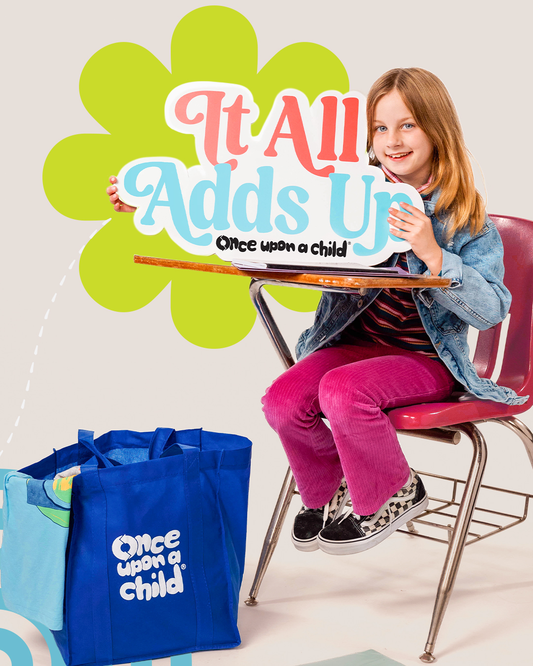 A child sitting at a desk. The photo is advertising back to school for Once Upon a Child Sherwood Park.